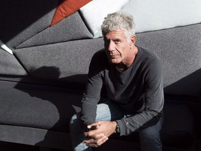 Anthony Bourdain poses for a photo during an interview with