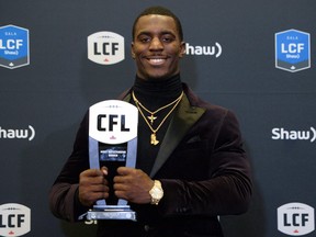 Toronto Argonauts running back James Wilder Jr., recipient of the Most Outstanding Rookie award, poses at the CFL awards on Thursday, Nov. 23, 2017. 
(The Canadian Press/Nathan Denette)