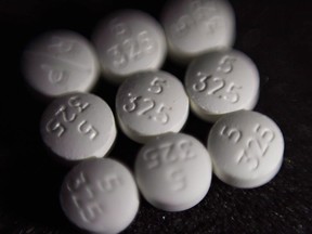 This Aug. 15, 2017, file photo shows an arrangement of pills of the opioid acetaminophen, also known as Percocet, in New York.