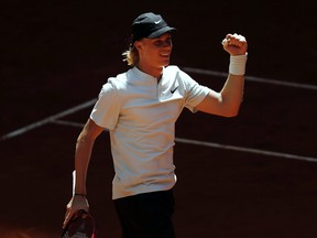 Denis Shapovalov celebrates his victory over Milos Raonic during the Madrid Open on Thursday, May 10, 2018. (AP Photo/Francisco Seco)