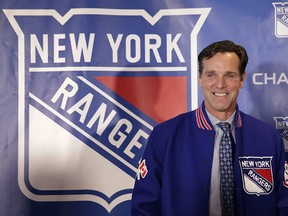 New York Rangers coach David Quinn poses during a news conference in New York, Thursday, May 24, 2018. (AP Photo/Seth Wenig)