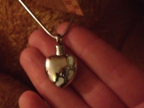 Kingston Police are asking for help locating a locket containing that was reportedly stolen holding the ashes of the victim's daughter.