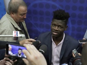 Mohamed Bamba, from Texas, speaks with the media at the NBA draft combine Thursday, May 17, 2018, in Chicago. (AP Photo/Charles Rex Arbogast)