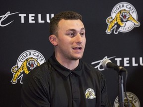 Former NFL quarterback and Heisman Trophy winner Johnny Manziel speaks during a press conference after announcing that he has signed a two-year contract to play in the CFL for the Hamilton Tiger-Cats in Hamilton, Ont., Saturday, May 19, 2018.