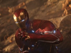 This image released by Marvel Studios shows Robert Downey Jr. as Iron Man in a scene from "Avengers: Infinity War." (Marvel Studios via AP) ORG XMIT: NYET211