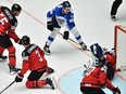 Finland's Mikko Rantanen (topR) scores a goal during the group B match Canada vs Finland of the 2018 IIHF Ice Hockey World Championship at the Jyske Bank Boxen in Herning, Denmark, on May 12, 2018.