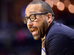 In this March 11, 2017, file photo, Memphis Grizzlies head coach David Fizdale calls to players during the first half of an NBA basketball game against the Atlanta Hawks in Memphis, Tenn.