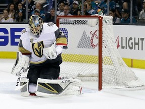 Vegas Golden Knights goaltender Marc-Andre Fleury stops a shot by the San Jose Sharks during the first period of Game 6 of an NHL hockey second-round playoff series Sunday, May 6, 2018, in San Jose, Calif. (AP Photo/Marcio Jose Sanchez)