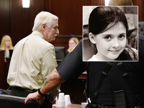 A photo of Cherish Perrywinkle is seen alongside a Donald Smith as he is led from the courtroom after being found guilty of all charges in the abduction, rape and murder of Cherish Perrywinkle, in the Duval County courtroom of Judge Mallory Cooper Wednesday, Feb. 14, 2018 in Jacksonville, Fla.