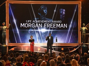 Actor Rita Moreno (L) and honouree Morgan Freeman onstage during the 24th Annual Screen Actors Guild Awards at The Shrine Auditorium on Jan. 21, 2018 in Los Angeles.