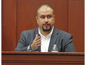 In this Sept. 13, 2016 file photo, George Zimmerman looks at the jury as he testifies in a Seminole County courtroom in Orlando, Fla.