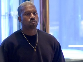 Kanye West arrives at Trump Tower December 13, 2016 as US President-elect Donald Trump continues to hold meetings in New York. (TIMOTHY A. CLARY/AFP/Getty Images)