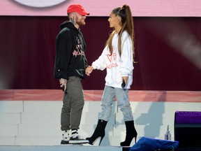In this handout provided by 'One Love Manchester' benefit concert (L) Mac Miller and Ariana Grande perform on stage on June 4, 2017 in Manchester, England. Donate at www.redcross.org.uk/love (Photo by Getty Images/Dave Hogan for One Love Manchester)