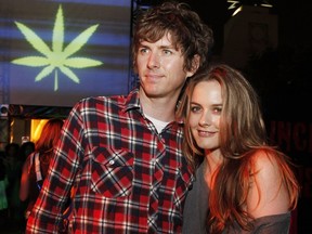 Alicia Silverstone and husband Christopher Jarecki pose at the afterparty for the premiere of Columbia Picture's "Pineapple Express" at the Mann Village Theater on July 31, 2008 in Los Angeles, California.  (Kevin Winter/Getty Images)