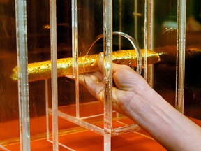 This August 2010 file photo shows a 17th-century gold bar, valued at $550,000, at the Mel Fisher Maritime Heritage Museum in Key West, Fla. (Rob O'Neal/The Key West Citizen via AP, File)