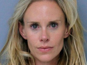 This Saturday, May 12, 2018 booking photo provided by St. Johns County, Florida, Sheriff's Office shows Krista Glover, the wife of former U.S. Open champion Lucas Glover