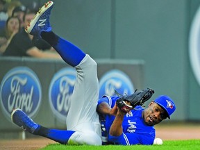 Curtis Granderson of the Toronto Blue Jays can't come up with the catch in foul territory of the ball hit by Eddie Rosario of the Minnesota Twins during the first inning of the game on May 1, 2018 at Target Field in Minneapolis, Minn.. The Jays own 7-4 in 10 innings. (Hannah Foslien/Getty Images)