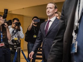 Facebook CEO Mark Zuckerberg leaves the EU Parliament in Brussels on Tuesday, May 22, 2018.  European Union lawmakers plan to press Zuckerberg on Tuesday about data protection standards at the internet giant at a hearing focused on a scandal over the alleged misuse of the personal information of millions of people.