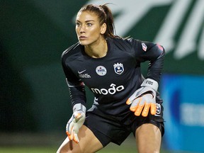 In this Oct. 1, 2015, file photo, Seattle Reign FC goalkeeper Hope Solo follows the action in Portland, Ore. (AP Photo/Craig Mitchelldyer, File)