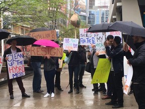 Ontario PC supporters protest outside Hydro One in Toronto on Tuesday, May 15, 2018.