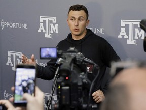 Former Cleveland Browns quarterback Johnny Manziel talks to the media after drills at his alma mater during Texas A&M's football Pro Day in College Station, Texas, Tuesday, March 27, 2018. (AP Photo/Michael Wyke)