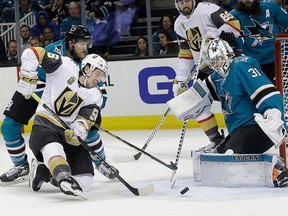 San Jose Sharks goalie Martin Jones defends a shot by Vegas Golden Knights defenceman Colin Miller during the second period of Game 3 of an NHL hockey second-round playoff series in San Jose, Calif., Monday, April 30, 2018.