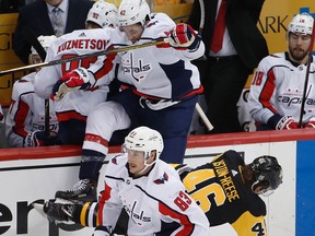 Washington Capitals' Tom Wilson collides with Pittsburgh Penguins' Zach Aston-Reese during Game 3 on May 1, 2018