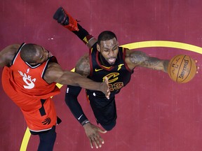 Cleveland Cavaliers' LeBron James shoots against Toronto Raptors' Serge Ibaka during the first half of Game 3 of an NBA basketball second-round playoff series Saturday, May 5, 2018, in Cleveland. (AP Photo/Tony Dejak)