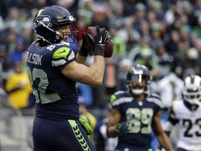 Seattle Seahawks tight end Luke Willson makes a catch for a touchdown against the Los Angeles Rams on Dec. 7, 2017. The Detroit Lions signed the tight end on Wednesday, March 21, 2018. (AP Photo/Elaine Thompson)