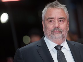 In this file photo taken on February 17, 2018 French director Luc Besson poses on the red carpet upon arrival for the premiere of the film "Eva" presented in competition during the 68th Berlinale film festival in Berlin. (STEFANIE LOOS/AFP/Getty Images)