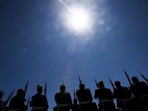 A Canadian military honour guard take part in a ceremony at the Canadian Forces Base Borden Centennial in Angus, Ont., on Thursday, June 9, 2016. (The Canadian Press/Nathan Denette)