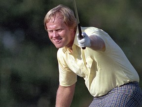In this Sunday, April 13, 1986, file photo, Jack Nicklaus watches his shot go for a birdie on the 17th at the Masters golf tournament in Augusta, Ga. (AP Photo/Joe Benton, File)