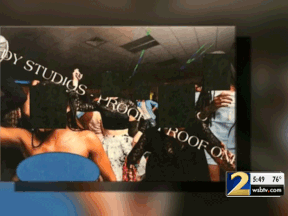 A Georgia teen girl's mother is suing a photography company claiming that it posted an inappropriate picture of her daughter at a school dance on its website. (WSBTV)
