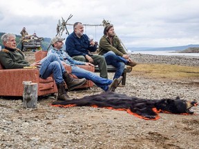 Anthony Bourdain, left, is shown in this undated handout photo posted on the Anthony Bourdain: Parts Unknown Facebook page for an episode featuring Newfoundland's local cuisine and landscapes.