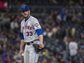 In this April 27, 2018, file New York Mets relief pitcher Matt Harvey pauses during the ninth inning against the San Diego Padres in San Diego.