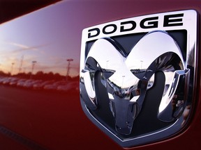 This Aug. 15, 2010 file photo shows a Dodge Ram logo at a dealership in Springfield, Ill. Fiat Chrysler is recalling 4.8 million vehicles in the U.S. because in rare but terrifying circumstances, drivers may not be able to turn off the cruise control. Affected models include the 2014-2019 Ram 1500 pickup, as well as the 2014-2018 Ram 2500, 3500, 4500 and 5500 pickups and chassis cab trucks.