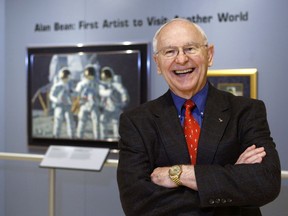 In this Oct. 1, 2008, file photo, Alan Bean, the fourth man to walk on the moon, is shown during a preview of his work at the Lyndon Baines Johnson Library and Museum in Austin, Texas.