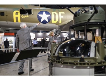 Visitors gather for a private viewing of the Memphis Belle, a Boeing B-17 "Flying Fortress," at the National Museum of the U.S. Air Force, Wednesday, May 16, 2018, in Dayton, Ohio.