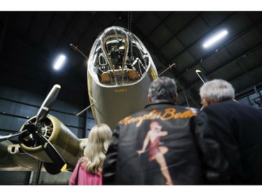 Visitors gather for a private viewing of the Memphis Belle, a Boeing B-17 "Flying Fortress," at the National Museum of the U.S. Air Force, Wednesday, May 16, 2018, in Dayton, Ohio.