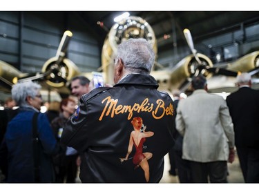 Visitors gather for a private viewing of the Memphis Belle, a Boeing B-17 "Flying Fortress," at the National Museum of the U.S. Air Force, Wednesday, May 16, 2018, in Dayton, Ohio.