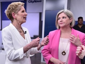 Liberal Premier Kathleen Wynne, left, and NDP Leader Andrea Horwath take part in the leader debate May 7, 2018.