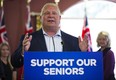 Ontario PC Leader Doug Ford speaks to residents during a campaign stop at Portal Village Retirement Home in Port Colborne, Ont., Tuesday, May 29, 2018. THE CANADIAN PRESS/Aaron Lynett