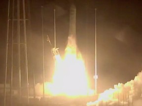 In this photo made from NASA video, the Orbital/ATK Cygnus CRS-9 sits on top of an Antares rocket as it launches from NASA's Wallops Flight Facility, Monday morning, May 21, 2018, in Virginia.