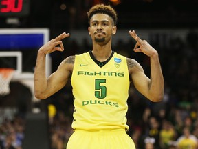 Tyler Dorsey #5 of the Oregon Ducks celebrates a 3-point basket against the Saint Joseph's Hawks in the second half during the second round of the 2016 NCAA Men's Basketball Tournament at Spokane Veterans Memorial Arena on March 20, 2016 in Spokane, Washington