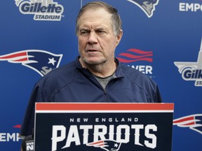 New England Patriots head coach Bill Belichick takes questions from reporters at the start of an NFL football organized team activities practice at the team's training camp, in Foxborough, Mass., Tuesday, May 22, 2018. (AP Photo/Steven Senne)