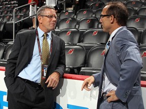 Nashville Predators assistant general manager Paul Fenton speaks with hockey analyst Ray Ferraro during the 2013 NHL Draft at the Prudential Center on June 30, 2013 in Newark, New Jersey.  (Bruce Bennett/Getty Images)