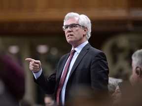 Minister of Natural Resources Jim Carr rises during Question Period in the House of Commons on Parliament Hill in Ottawa on April 24, 2018.