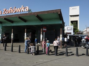 Families wait for word about miners who have gone missing after a tremor at the Zofiowka coal mine in Jastrzebie-Zdroj in southern Poland, Saturday, May 5, 2018.