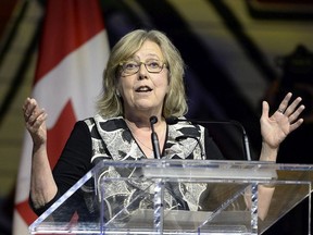 Green Party leader Elizabeth May jokes during her speech at the Parliamentary Press Gallery Dinner at the Museum of History in Gatineau, Quebec on Saturday, May 26, 2018.