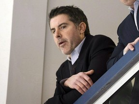 Brandon Pridham, assistant to the GM, watches the Leafs practice in Toronto on January 6, 2015. (THE CANADIAN PRESS/Darren Calabrese)